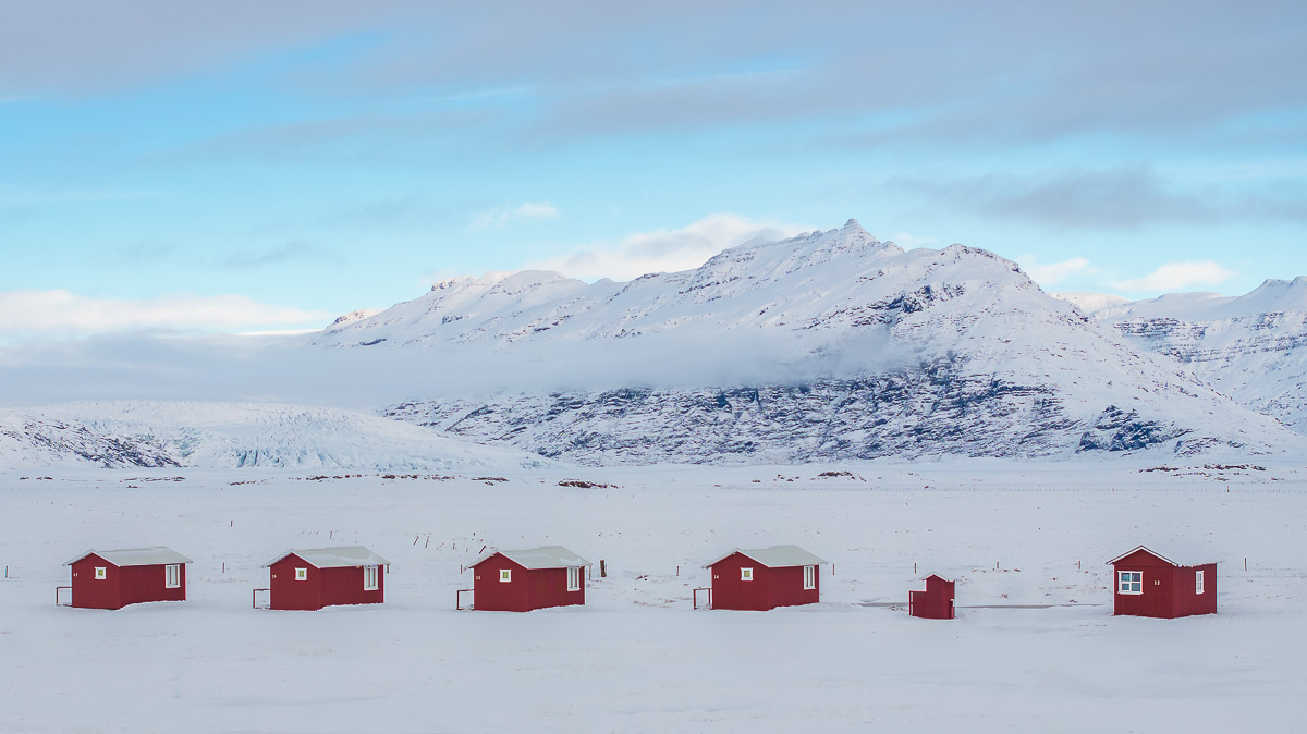 MAB-DJI-20240316-ICELAND-GLACIER-RED-CABINS-SNOW-0005.jpg