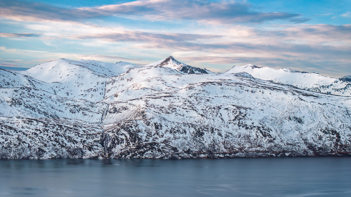 MAB-DJI-20250208-NORWAY-SENJA-MOUNTAINS-FJORD-WINTER-0002.jpg